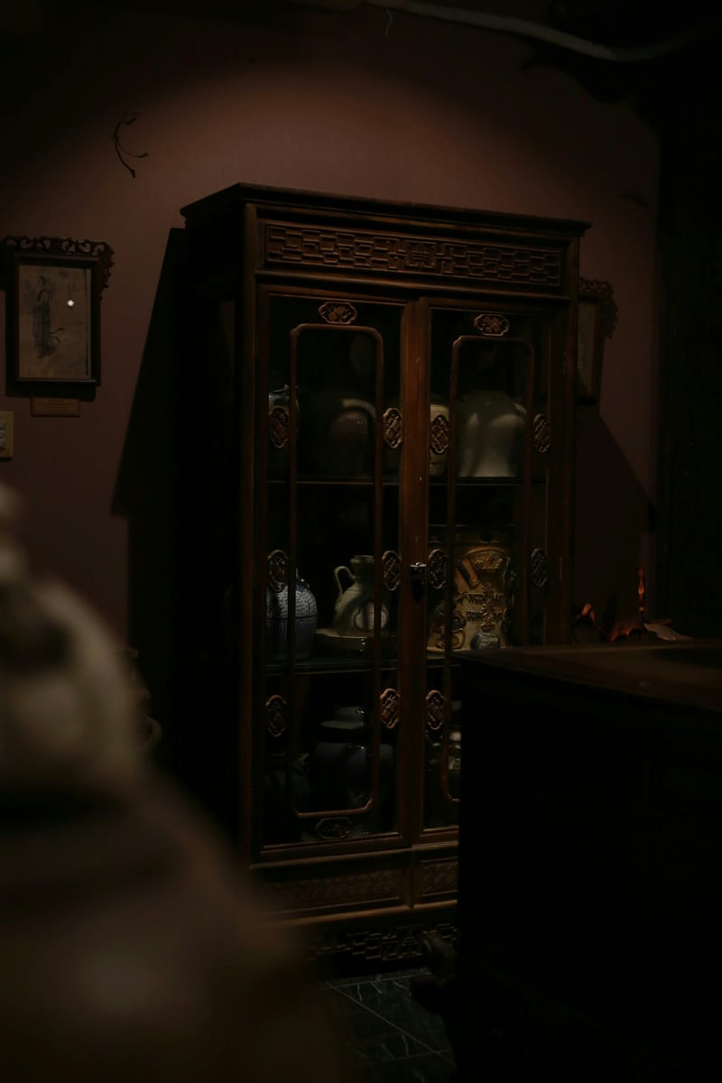 antique wooden cabinet with curiosities