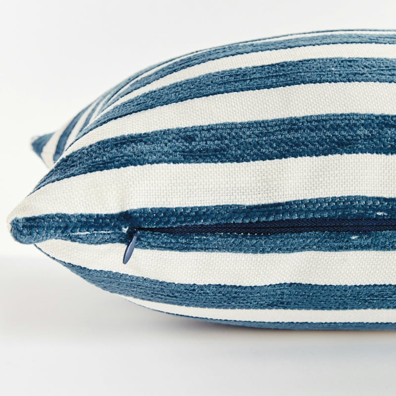 blue and white striped pillow