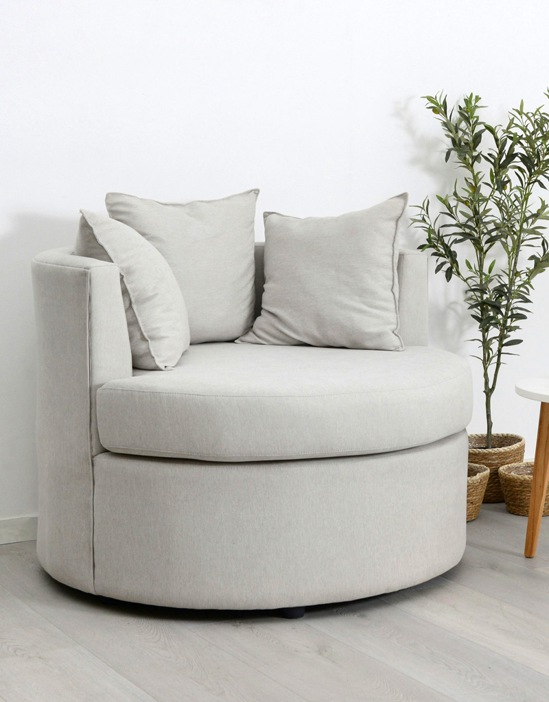 living room armchair and plant
