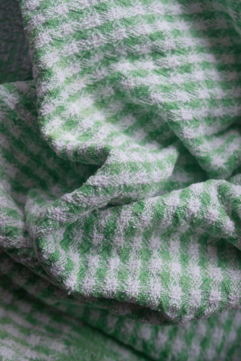blanket with mint green stripes