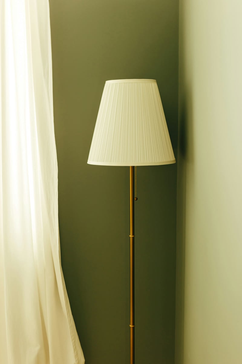 warm floor lamp green walls